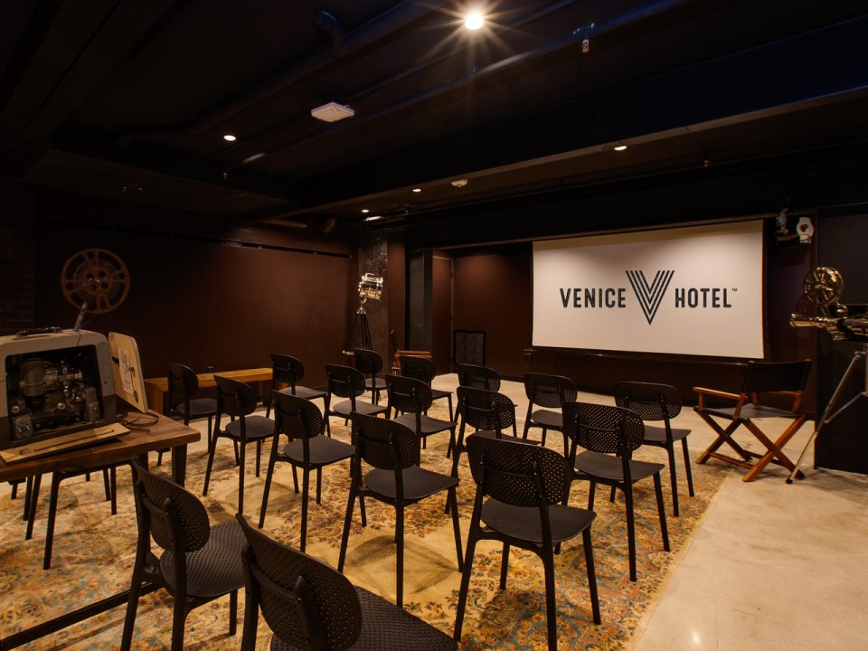 Venice V Hotel basement speakeasy with movie theater setup