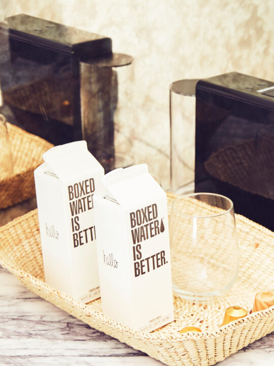 Boxed water in guest rooms