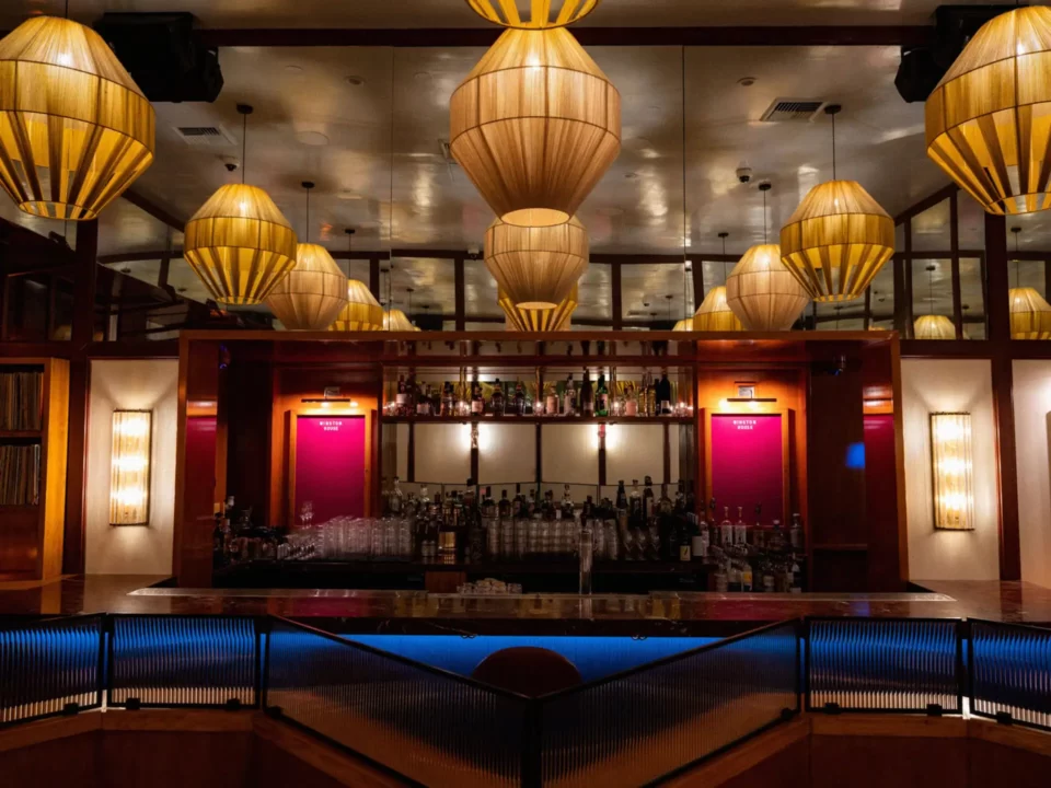 Winston House features beautiful hanging lamps that illuminate the space from the ceiling.